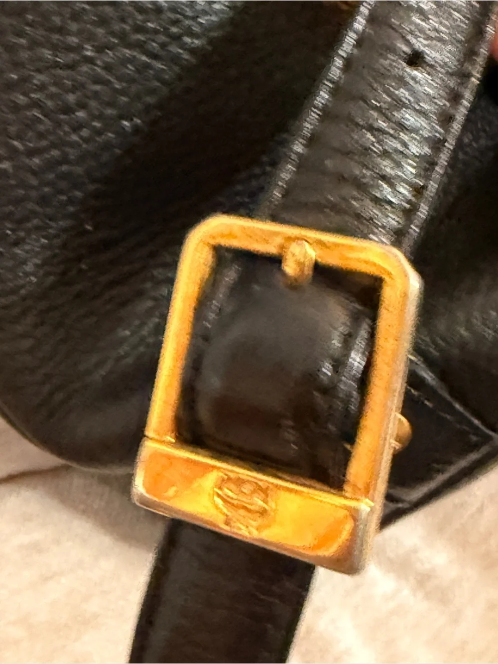 MCM Black Leather Backpack with Gold Accents and Front Pockets